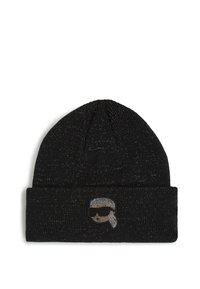 Bonnet en tricot noir avec fils métalliques argentés, conçu avec un revers, arborant un patch logo circulaire avec une illustration d'une figure portant des lunettes de soleil.