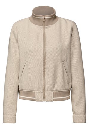Beige lightweight jacket with a textured fabric, high collared neck, front zip, and two patch pockets. Ribbed cuffs and waistband.