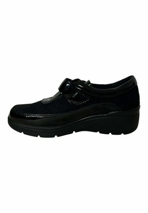 Black women's shoe with quilted fabric, glossy leather trim, hook-and-loop strap, and thick sole for added comfort and support.