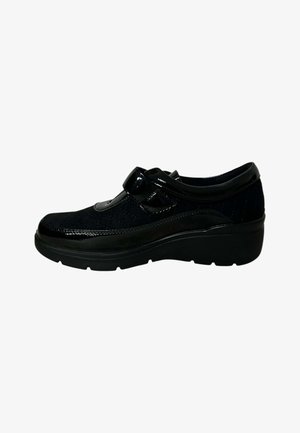 Black women's shoe with quilted fabric, glossy leather trim, hook-and-loop strap, and thick sole for added comfort and support.