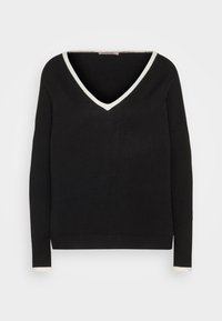 Maglione di lana nero con scollo a V profondo e bordo bianco a contrasto, maniche lunghe e vita aderente con dettagli bianchi ai polsini.