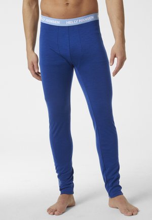Blauwe thermoleggings met een zachte textuur en een strakke pasvorm, afgewerkt met een lichtgrijze elastische tailleband met het label "HELLY HANSEN."