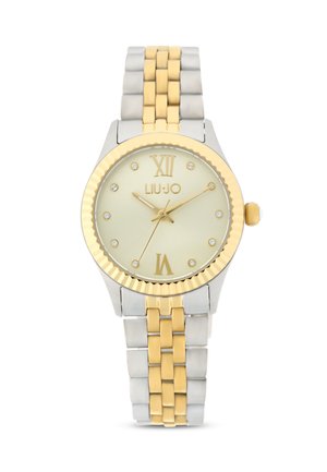 Ura - gold coloured