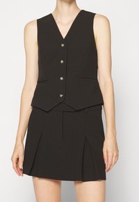 DESIGNERS REMIX Väst - black