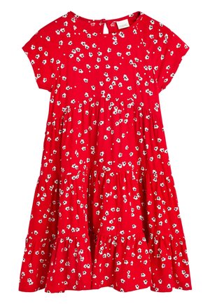 Red short-sleeve dress with white and black floral pattern, tiered skirt, and keyhole button closure at the back neckline.