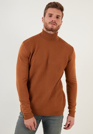 Brown, long-sleeve turtleneck sweater with a textured pattern on the front and smooth sleeves. Ribbed cuffs and hem, made from soft fabric.