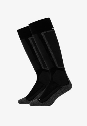 Black knee-high socks featuring a textured design with a solid toe and heel. Reinforced accents in dark gray for added durability.