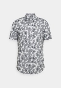 Lyhythihainen paita valkoisena, jossa harmaa lehtikuvio. Valmistettu kevyestä kankaasta, jossa on napillinen kaulus ja etunapit.