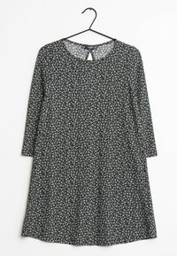 Musta mekko pitkillä hihoilla, jossa on valkoisia ja vaaleansinisiä kukkakuoseja, pyöreä pääntie ja pieni avainaukko takana.