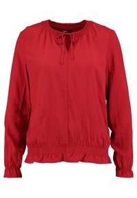 Rød bluse med lange ærmer, gatherings ved halsen og manchetterne, snor i halsen, elastisk kant, og en blød, glat tekstur.