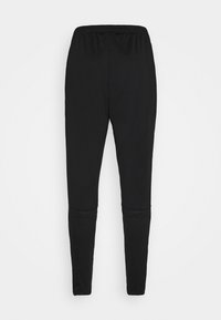 Pantalon jogger noir coupe slim avec taille élastique, sans poches ni logos visibles, présenté sur fond blanc uni.