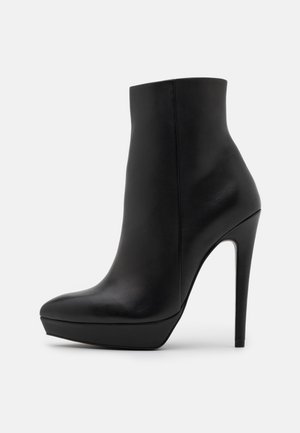 Stivaletti con tacco - black