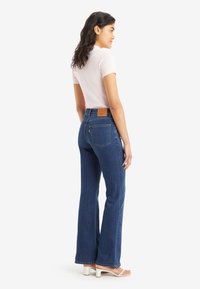 Levi's® 726™ HIGH RISE FLARE - Bootcut piegriezuma džinsi - made my day