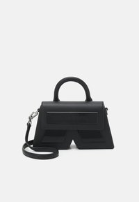 Black structured handbag made of leather-like material, featuring a top handle and a detachable shoulder strap. Notable logo detail on front.