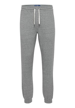 Heather gray sweatpants made of soft fabric with an elastic waist, white drawstring, and ribbed cuffs at the ankles. No pockets.
