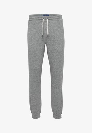 Heather sivi trenirke iz mehkega blaga z elastičnim pasom, belim vezalko in rebrastimi manšetami pri gležnjih. Brez žepov.