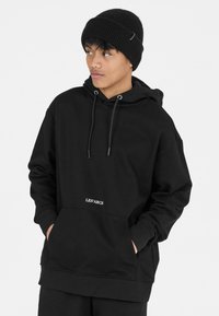 Les'Arcs Kapuzenpullover - zwart