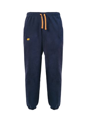 Marineblaue Jogginghose mit elastischem Bund, orangefarbenen Kordeln und Knöchelabschlüssen. Sie verfügt über ein kleines gelbes Elefantenlogo am linken Oberschenkel.