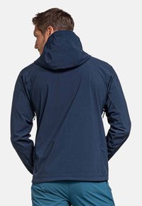 Marineblaue wasserdichte Jacke mit Kapuze, ausgestattet mit einer glatten Textur, Reißverschluss-Seitentaschen und einer figurschmeichelnden Passform.