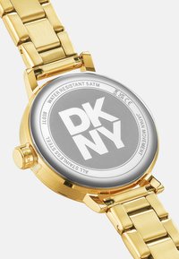 DKNY Montre - gold coloured