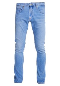 Jeans de mezclilla azul claro con corte ajustado, con bolsillos delanteros, un bolsillo para monedas y cierre de botón metálico. Textura suave con un acabado desgastado.