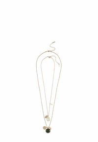 Two layered gold necklaces with multiple pendants, including a green stone, a white teardrop, and small gold charms on fine chains.