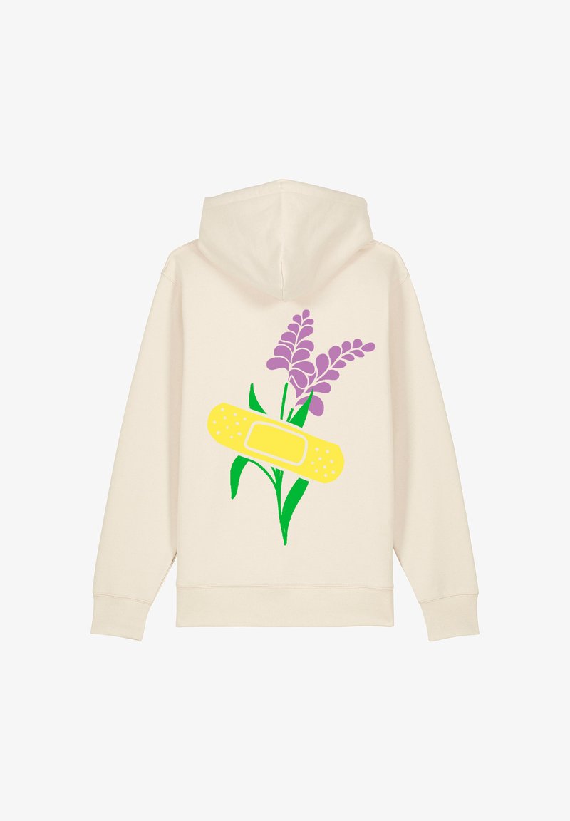 Hoodie créme avec un motif de fleurs violettes et un bandage jaune dans le dos, fabriqué en tissu doux avec une coupe décontractée.