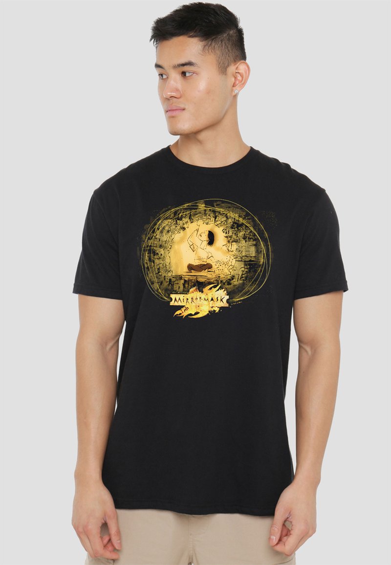 Black cotton t-shirt featuring a yellow graphic print of a character within a circular design, with text and flame accents at the bottom.