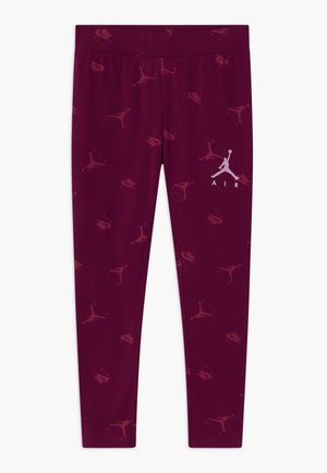 Burgundy leggings, joissa on toistuva logokuvio ja valkoinen Air Jordan -logo vasemmassa lahkeessa, valmistettu venyvästä materiaalista.