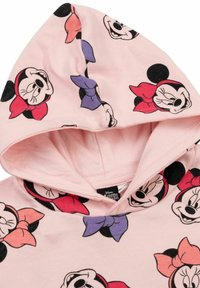 Felpa con cappuccio rosa chiaro caratterizzata da stampe grafiche ripetute di Minnie Mouse con fiocchi di diversi colori in rosso, rosa e viola. Tessuto morbido.