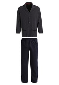 Marineblauw pyjama set met een polkadot patroon op het shirt met driekwartmouwen en bijpassende effen marineblauwe broeken met een elastische tailleband.