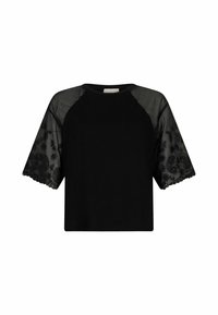 Top corto nero con maniche corte trasparenti ricamate in nero, decorate con motivi paisley e orli ondulati. Realizzato in tessuto morbido.