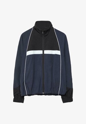 Mørkeblå og sort zip-up træningsjakke med hvide horisontale og vertikale striber, elastiske manchetter og talje.