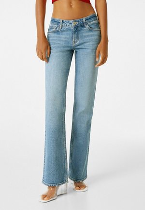 COMFORT FIT - Flared jeans - light blue denim