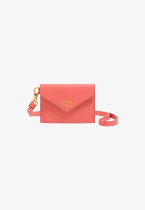 Coral leather crossbody bag with an envelope design, gold lettering, and a detachable strap for versatility. Smooth texture, compact shape.