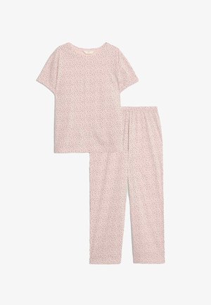 Set di pigiama composto da una maglietta a maniche corte rosa chiaro e pantaloni lunghi con piccoli pois neri e cintura elastica sui pantaloni.
