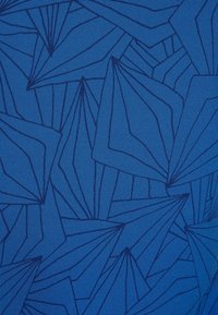 Blue fabric with a geometric pattern resembling folded paper shapes in a darker blue outline. The texture is smooth and slightly textured.