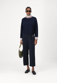 Tommy Hilfiger Püksid - desert sky
