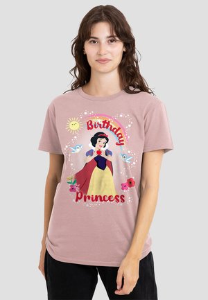 Light pink t-shirt featuring a cartoon princess design, text "Birthday Princess" in red, with floral and star patterns. Short sleeves and round neck.