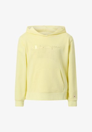 Sweat à capuche en coton jaune avec une poche kangourou à l'avant, des poignets côtelés et un logo "Champion" embossé sur la poitrine. Texture douce.