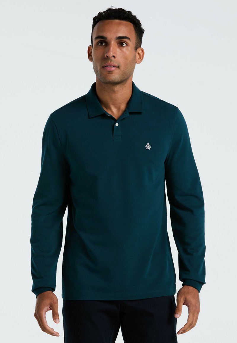 Polohemd met lange mouwen in donkerteal, gemaakt van gestructureerde stof, met een kraag en een klein logo op de borst, met een rechte zoom.