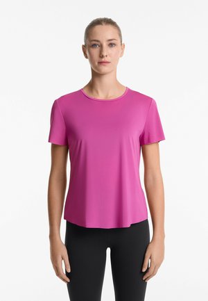 Pink short-sleeve athletic top in a smooth fabric with a round neckline. Features side mesh panels for ventilation and a relaxed fit.