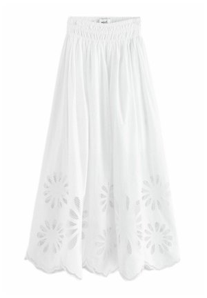 Jupe midi blanche avec taille élastique, comprenant des découpes florales brodées et un ourlet festonné.