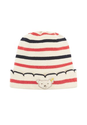 Berretto a maglia a righe in crema, rosso e blu navy. Presenta una patch a forma di faccia d'orso e un bordo ondulato nella parte inferiore. Texture morbida.