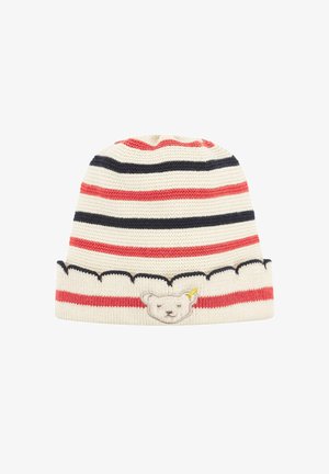 Gestreifte Strickmütze in Creme, Rot und Marineblau. Mit einem Bärenkopf-Patch und gezacktem Rand am unteren Ende. Weiche Textur.
