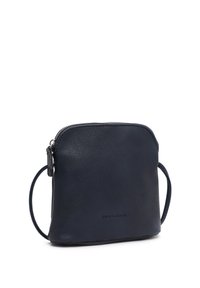 Compact dark navy leather wristlet pouch with zip closure and subtle brand embossing, designed for carrying small personal items.