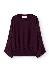 Viininpunainen neule, jossa on resorireuna, väljä istuvuus ja runsaat hihat, joissa on sivuilla kerätty yksityiskohta. Pehmeä tekstuuri.