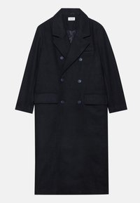 Manteau noir croisé en tissu texturé, avec un large revers, deux poches avant et des boutons foncés. Silhouette longue et droite.