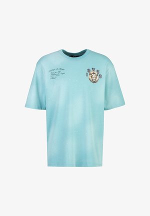 Hellblaues Baumwoll-T-Shirt mit einem Löwenmotiv und Textdetails. Kurze Ärmel und ein Rundhalsausschnitt mit lockerer Passform.