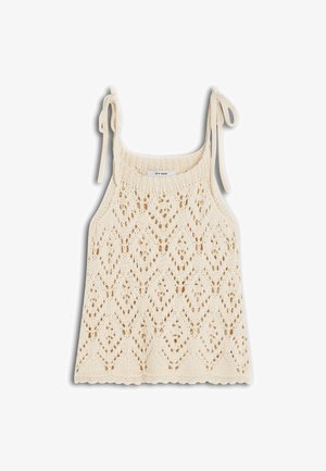 Top tricotat fără mâneci, de culoare crem, cu model de dantelă în formă de diamant și bretele cu fundițe la umeri.